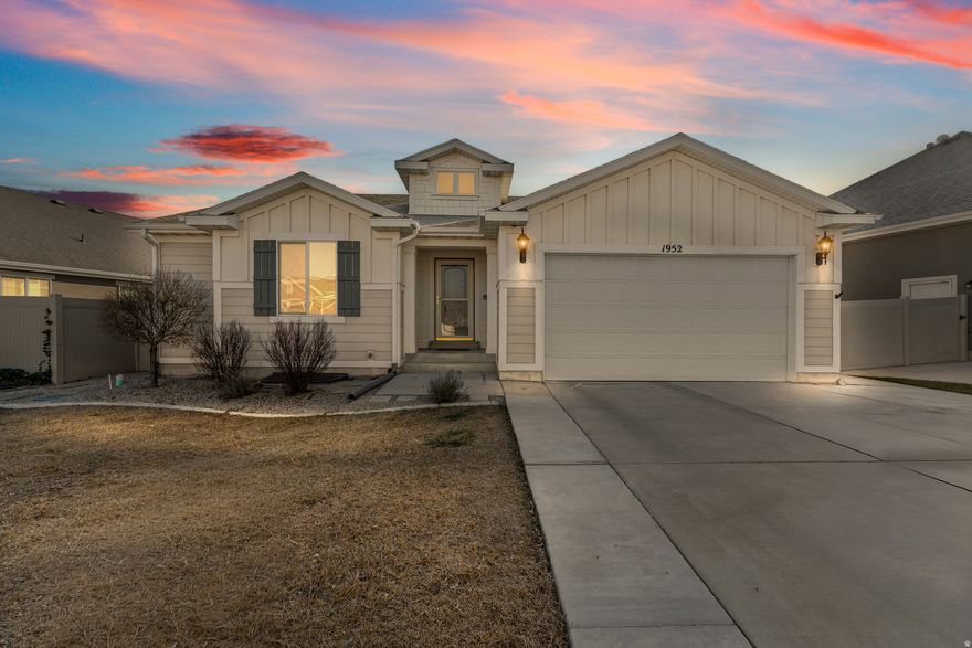 Seller offering 1/0 rate buydown with preferred lender - 5.161% first-year rate available. Contact co agent Brandon for details. Incredible second-owner Lehi rambler now available, this home truly has it all. From the moment you enter, you're welcomed by beautiful hardwood floors, an open and inviting layout, and a whole-home automation and surround sound system designed for both everyday living and entertaining. The chef's kitchen is a standout, featuring quartz countertops, a large island with built-in shelving and bar seating, stainless steel appliances, a gas range, vaulted ceilings, and a semi-formal dining area that flows seamlessly into the spacious family room, perfect for gatherings with family and friends. The primary suite is generously sized with tall vaulted ceilings and a luxurious en-suite bath offering dual sinks, tile floors, a separate tub and shower, and a walk-in closet. Two additional main-level bedrooms with walk-in closets share a full bath, and the mudroom and oversized garage provide excellent storage. Downstairs, the fully finished basement impresses with a large family room complete with projector and screen for movie nights, two bedrooms (one with an oversized walk-in closet), an additional flex room ideal for a home office, gym, or hobby space, a beautifully finished  bath with rain shower head, abundant storage, and cold storage. Thoughtful upgrades include a water softener, newer water heater (2022), and radon mitigation system. Outside, enjoy a fully fenced backyard with a spacious patio for summer barbecues, dedicated seating area, sandbox/shed foundation, and trampoline that stays, creating the perfect space for play and entertaining. All of this is ideally located near the new Children's Hospital, Thanksgiving Point, Cornbellys, museums, dining, and freeway access. This exceptional home checks every box, schedule your private tour today before it's gone. Buyer and Buyer's Agent to verify all information. Square footage figures are provided as a courtesy estimate only. Buyer is advised to obtain independent measurements.