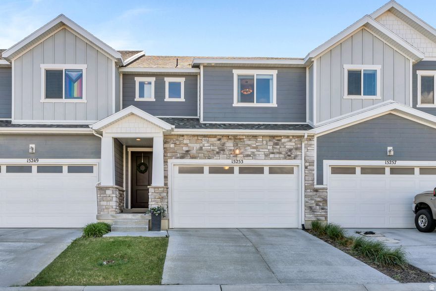 Check out this spacious, fully finished townhome just minutes from I-15-perfectly located for quick access anywhere in the valley! A stunning two-story foyer with custom paneling sets the tone with a grand, upscale feel.  Enjoy modern lighting throughout, an updated half bath with upgraded fixtures, and a stylish kitchen featuring quartz countertops, a sleek backsplash, and under-cabinet lighting. Even the laundry closet pops with designer wallpaper and a built-in drying rack.  Bring the movie theater home with a fully equipped basement featuring a 5.1.4 in-wall surround sound system (with room to expand), plus a mini fridge, storage room, and potential for an additional bedroom. Loaded with smart home features including Leviton Decora switches, Nest smart lock, MyQ garage system, and a 4th-gen Nest thermostat with sensors.  Homes like this don't last-schedule your showing today!