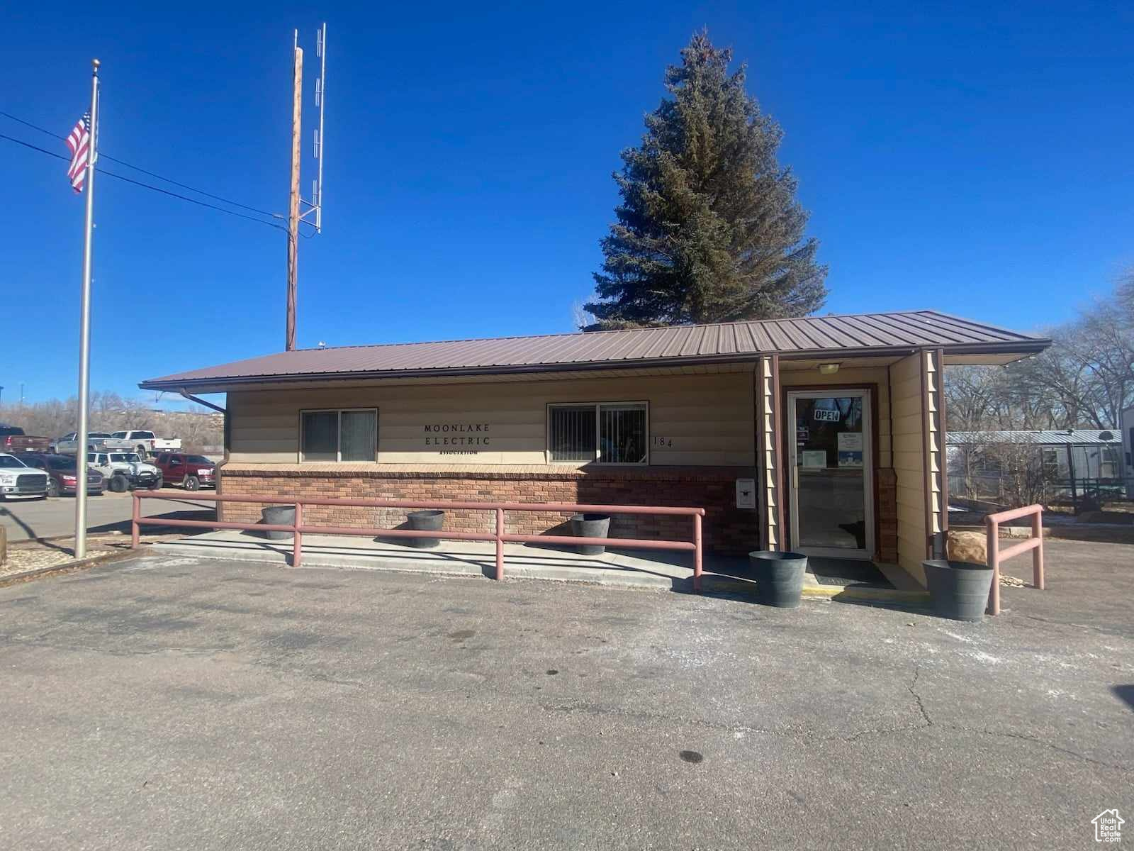 The Duchesne Moon Lake Electric Office at 184 North Center Street! Frontage on State Road 87!  Clean and ready for your Business!  The Main part of the office is all set up with a customer counter and room for all your technology! There is another office room on the north end of the building.  And a nice restroom.  The building is connected to all public utilities. The office sits on one of the best corner lots in the area and has plenty  of gravel parking in the rear and paved parking out front!  Easy access day or night! Come take a look!