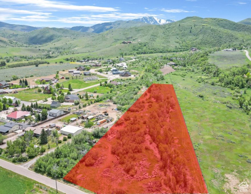 RARE 5 ACRE BUILDING LOT WITH AMAZING VIEWS OF THE SURROUNDING MOUNTAINS, a stream and plenty of space to build your dream home. 1 HUNTSVILLE WATER CONNECTION INCLUDED. Enjoy the freedom of no HOA restrictions. Horse property. Only minutes from Pineview / Causey Reservoir for your summer recreation of boating, paddle boarding, kayaking, fishing, mountain biking and hiking. With easy access to world class skiing (Snowbasin, Powder Mountain and Nordic), Snowmobiling, Cross Country Skiing, Snow Shoeing and so much more.... Please call agent for additional information. For option to purchase 4 acres see MLS #