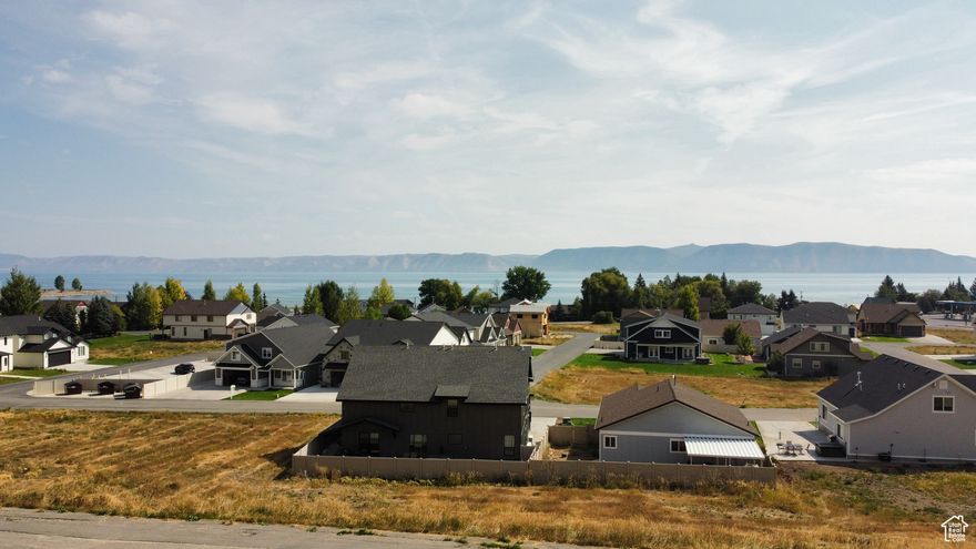 Build your dream home or vacation getaway on this beautiful 0.12-acre lot in the desirable Lochwood subdivision! Located just minutes from Bear Lake, this lot offers stunning lake views, access to utilities (power, sewer, and water stubbed), and convenient year-round access. HOA includes lawn care, a community clubhouse, swimming pool, and playground. Whether you're looking for a peaceful retreat or a smart investment, this property is ready to go. Enjoy all that Garden City has to offer-boating, beaches, trails, and more. Don't miss this prime opportunity!