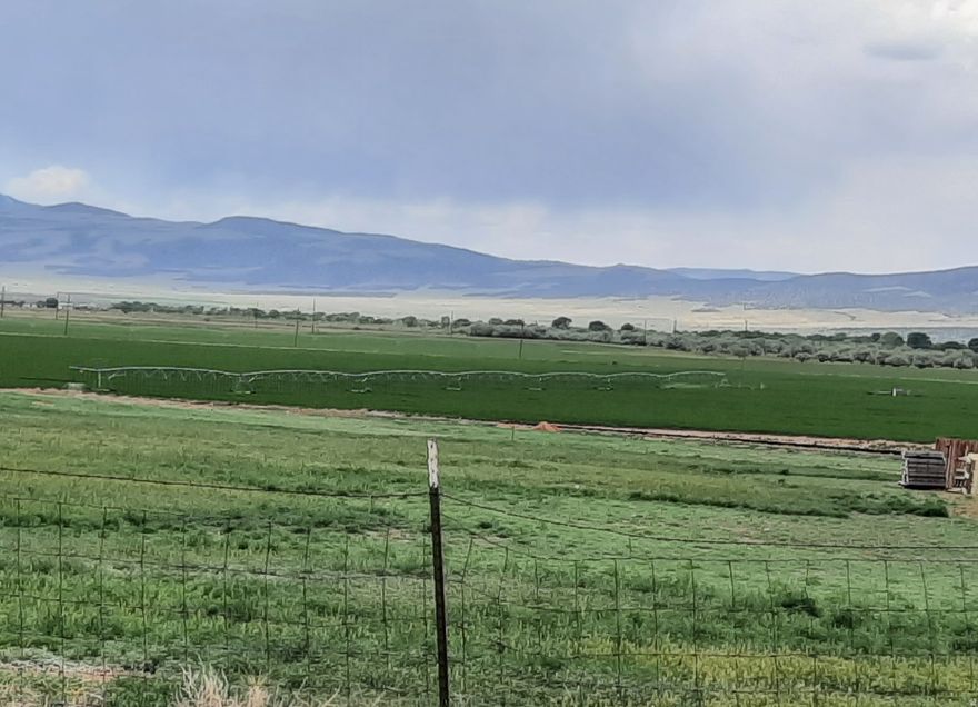 Offering a fabulous opportunity to own one of the old original family farms in the heart of Cedar City. You will love this lush10.77 irrigated acres including corrals, sheds, and 15 total shares irrigation water (7.5 shares primary class 1 & 2, 7.5 shares secondary class 3 & 4). Fully fenced. Borders beautiful Old Farm Subdivision. Exceptional development potential. Farm is currently leased. It is the sole responsibility of Buyer and Buyers Agent to verify accuracy of all information.  Parcel B-1548-0000-0000