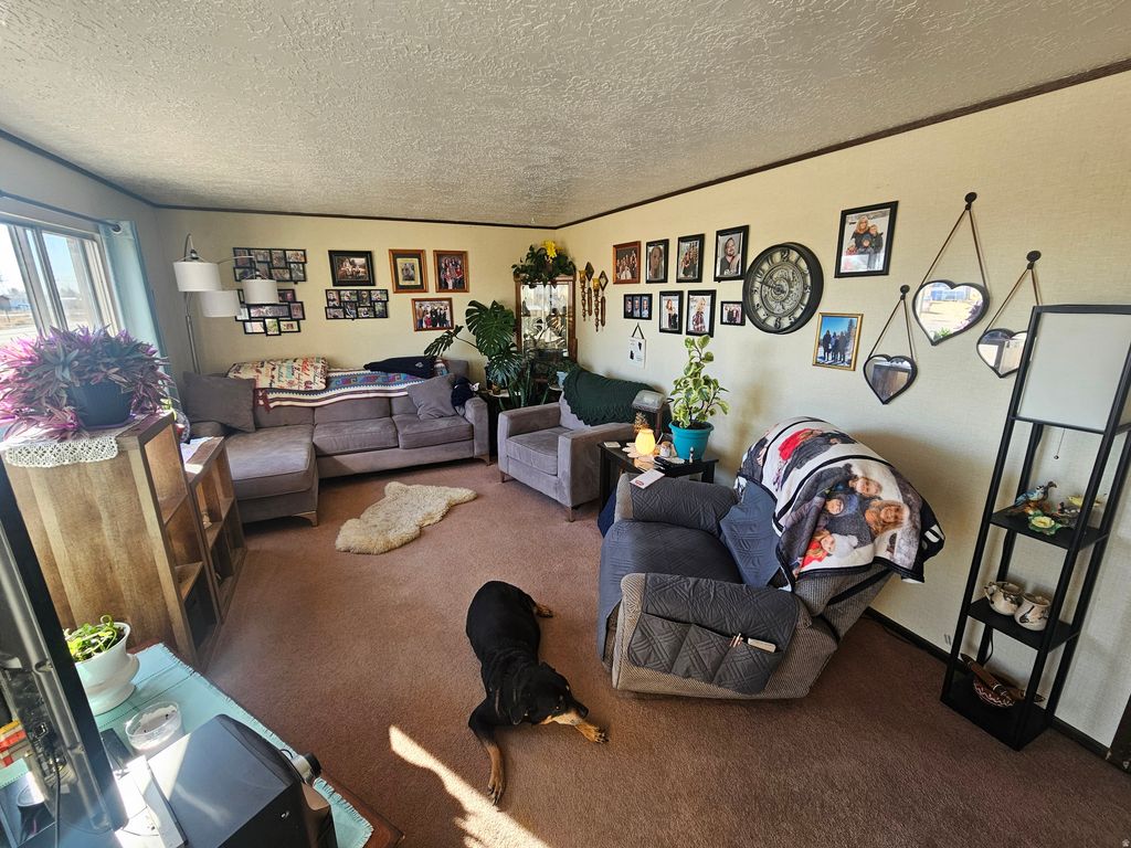 Photo of 385 N 5750 E, Fort Duchesne, UT 84026 (MLS # 2136027)