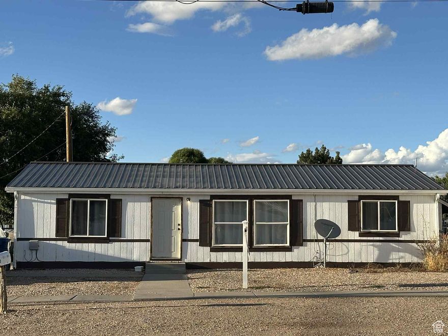 Great value! This 3-bedroom, 2-bath home sits on a corner lot and features convenient single-level living. The floor plan offers comfortable living spaces, plus a covered patio to relax or entertain. Additional highlights include a durable metal roof and RV parking. A solid home at an affordable price-ready for you to make it your own. Seller requires 24 hours notice for showings.