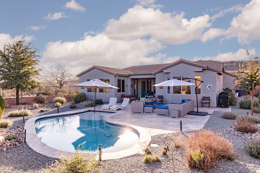 Beautifully situated high above the neighborhood, this 4-bedroom home plus office offers elevated golf course and mountain views and a peaceful sense of privacy. The oversized primary suite features an expansive walk-in closet and generous space to unwind. Step outside to your own private, low-maintenance pool-perfect for relaxing or entertaining. With 2.5 bathrooms and a functional layout, this home is both comfortable and versatile. Enjoy a vibrant community with walking trails, parks, and a clubhouse offering a gym, indoor and outdoor pools, hot tub, and pickleball courts. Buyer to verify all.