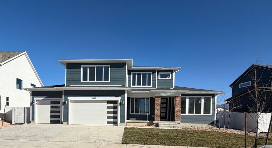 **Quick Move In** This stunning home features four bedrooms, two and a half bathrooms, and a two-story ceiling in the main living area, filling both floors with natural light. Off the entryway, a versatile room can serve as a formal living room or office, while across the hall, the primary suite offers an attached bathroom and impressive walk-in closet. The home opens into a spacious kitchen, family room, and semi-formal dining area, with a ten foot island making it a chefs dream. Upstairs, three spacious bedrooms include one that can be converted into a loft or playroom. The laundry room and second full bath are also conveniently located upstairs.