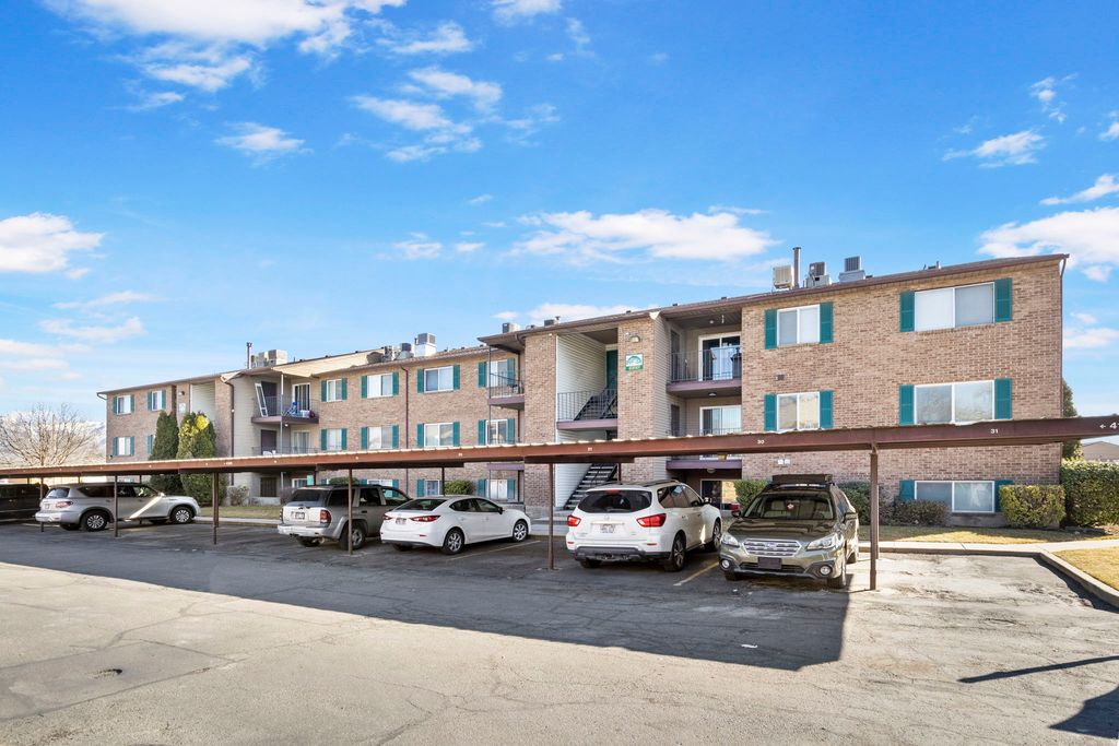 Photo of 4160 S OAK MEADOWS DR DR W #11, Taylorsville, UT 84123 (MLS # 2130354)