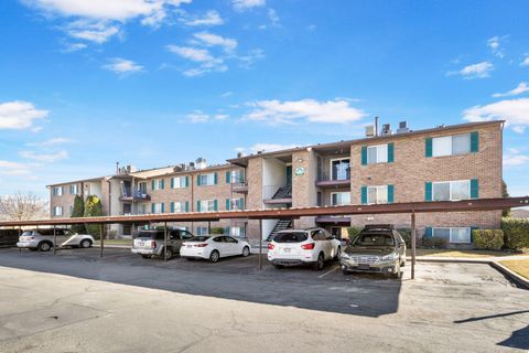 Photo of 4160 S OAK MEADOWS DR DR W #11, Taylorsville, UT 84123 (MLS # 2130354)