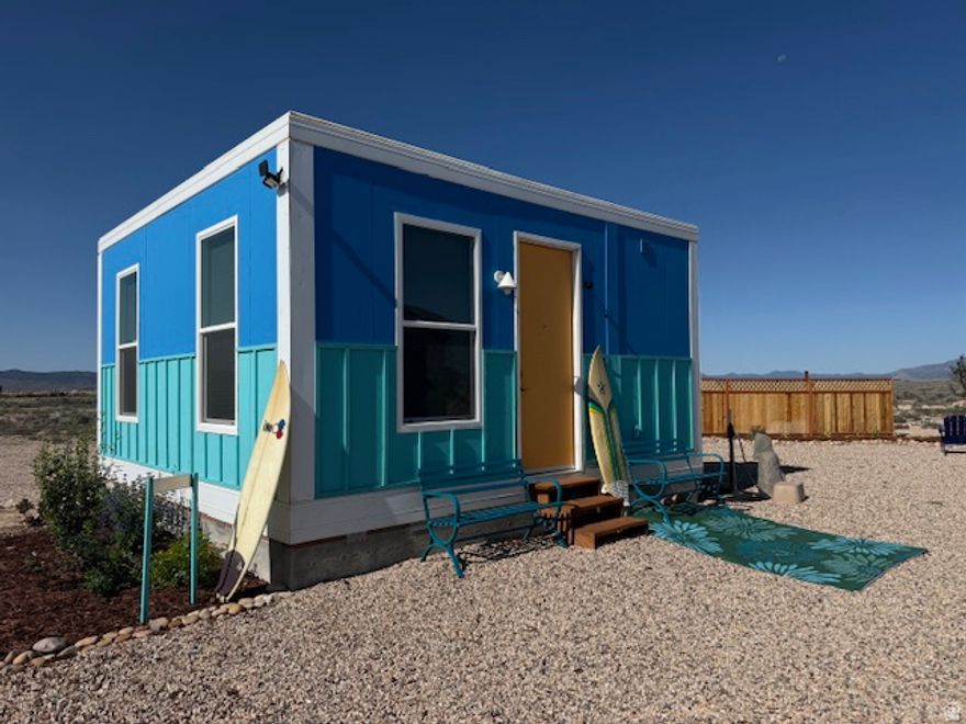 5.49 Acres in Beryl Utah w/BOXABL Home, fully furnished Bio Hack Shack and Build-Ready Foundation. Right in between Cedar City and Saint George Utah.  Unique 5.49 acre property in Beryl Utah featuring a BOXABL home and a fully furnished turnkey bio hack shack. The Bio Hack Shack includes a sunlighten infrared sauna, cold plunge, red light therapy, weightlifting station, stationary bike, and is fully furnished--perfect for wellness, fitness, or creative retreats. The property includes 2 one car covered parking, a metal building suitable for a second Bio Hack Shack or workshop, and a poured foundation with utilities already connected, ready for additional construction. Home and Bio Hack Shack is gated and fenced with a fully landscaped yard with automated irrigation. Utilities are fully installed with septic and power connected, and ready to connect to the second home, making this property move-in ready. Ideal for homesteading, off-grid living, wellness retreats, or private rural living with room to expand. Open desert views, countless roads to four wheel on, quiet surroundings and breathtaking night skies for stargazing and celestial observation.