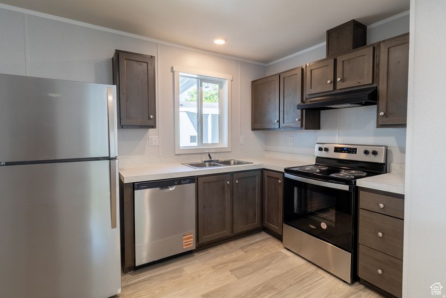 FIRST 6 MONTHS OF FREE LOT RENT! Behold! A pristine jewel, a never-before-lived-in 2025 model, awaits its fortunate owner! Imagine stepping across the threshold of a home where every corner whispers of new beginnings. Picture yourself relaxing under the shelter of newly installed porch and carport awnings, offering a delightful embrace from the elements. And there's more! A sturdy 6x8 metal shed stands ready to house your treasures and tools. While the square footage is offered as a courtesy, inviting you to personally confirm its generous dimensions, the promise of a fresh start is undeniable. Navigating your path to ownership is important to us, and we can help guide you through financing options. Kindly note that this exceptional home resides within a vibrant community with established lot rent and rules. To discover the specifics of this welcoming neighborhood, please call Park Management directly. They hold the keys to this essential information, and we encourage you to connect with them rather than the listing agent or owner. Please also note that this charming abode is firmly rooted and cannot be moved. Embrace the opportunity to make this brand-new haven yours! Transferred HOME WARRANTY from Fleetwood included! ALL MOBILE HOMES SOLD AS IS! Seller financing available - ask for details.THIS IS A 55+ RETIREMENT COMMUNITY!