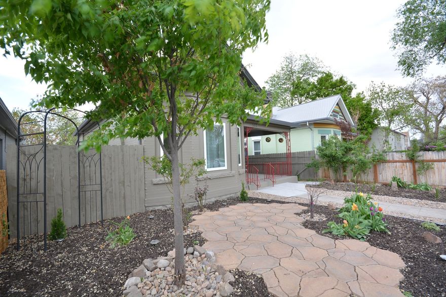 New electrical. New plumbing. New ductwork. New insulation. High-efficiency furnace. Tankless water heater. New double pane windows. Elegant full remodel. Secluded and fully-fenced yard. Paver patios in front and back. Rental potential. ADU (mother-in-law) in basement (just add a door.) 2 kitchens one up, one down. Both kitchens have gas ranges, and stainless steel refrigerators. Beautiful white quartz on main floor with a large 33-inch sink. Granite countertops in basement. Wine cooler under cabinet in main floor kitchen.  2 laundry rooms (a rare feature!) one up, one down. 4 total bathrooms. 2 bedrooms on main floor with en-suite bathroom, plus a half bath and a full bath downstairs. Large soaking tub in the rear en-suite bathroom. Perfect highly-sought location for everything: University of Utah. 9th and 9th (less than a mile,) Downtown Salt Lake City, Salt Lake Clinic, Bennion Elementary, McGillis School, Judge Memorial, East High School, Bryant Middle School, Salt Lake Regional Medical Center (Holy Cross,) Trolley Square, Gilgal Sculpture Garden. One street from Trax. Great shopping and dining all around. Lot includes a large parking area in back for 3-plus cars. Additional convenient public parking in front. Xeriscaped with pavers, stones and mulch. Seller related to listing broker.