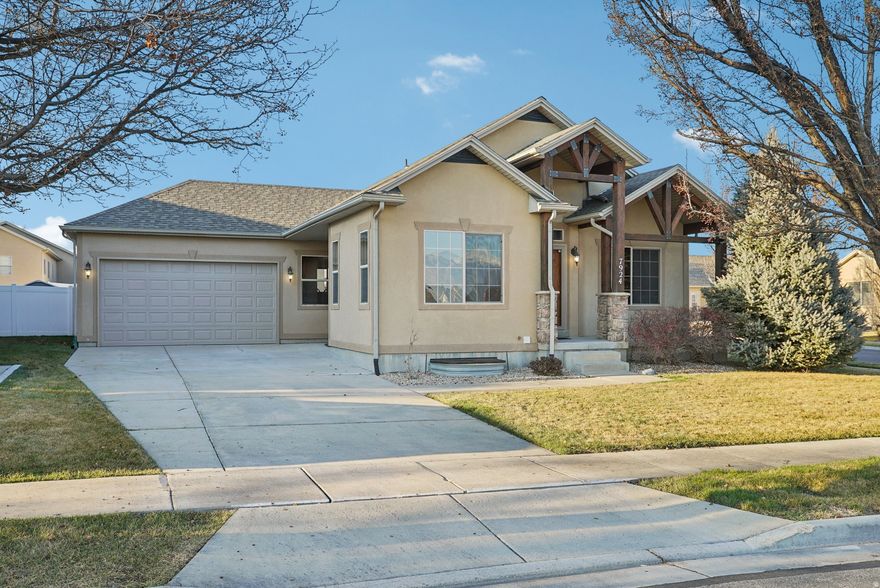 GRAND OPENING | OPEN HOUSE | JANUARY 17 |  Beautifully updated West Jordan home offering true low-maintenance living with an HOA that maintains the entire yard, including the backyard as well as snow removal. Fresh interior paint and new carpet throughout, with recent exterior improvements including new stucco on the back of the home and new concrete in the backyard. The main level features a cozy fireplace, half bath, and a flexible sitting room or home office, along with a laundry room with sink and cabinets. The primary suite includes a walk-in closet, double vanity, and jetted tub. The finished basement offers a large family room, two additional bedrooms, a full bath, and a flex space. Major updates include a new roof, furnace, A/C unit, tankless water heater, water softener, all new smoke and CO detectors, and a new insulated garage door. Appliances are less than two years old, refrigerator included. Enjoy outdoor space with a new TimberTech deck, which is plumbed for a gas grill and included shed. Convenient West Jordan location near parks, shopping, dining, and freeway access. Buyer to verify all information.