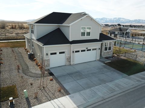 Photo of 633 W JUNEGRASS LN, Stansbury Park, UT 84074 (MLS # 2126769)