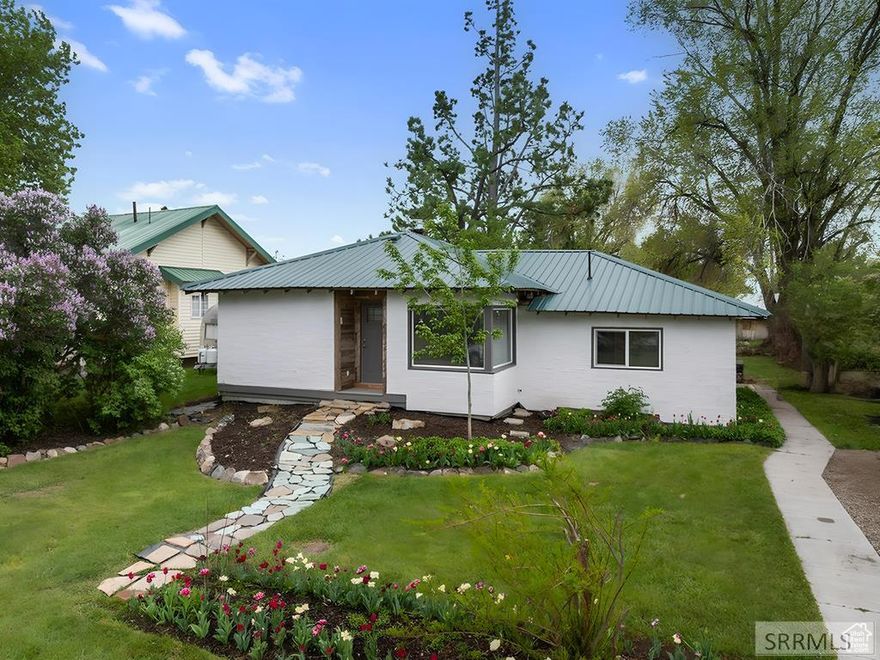 Timeless Charm Meets Modern Luxury in Rockland Step into this beautifully remodeled early 1900s home where classic architecture blends seamlessly with modern design. New HVAC and air conditioning! No expense has been spared in transforming this residence into a luxurious, move-in-ready retreat. From the solid surface countertops to the high-end luxury vinyl plank flooring, every detail reflects quality and style. The full-service kitchen is both functional and elegant, perfectly suited for entertaining or everyday living. Choose between a formal dining room or a spacious office to fit your lifestyle. The exquisite trim work throughout, including crown molding in the living room, adds a refined touch, while two oversized windows flood the space with natural light. The expansive master suite offers a walk-out to the backyard, double vanities, a walk-in closet, and private access for morning coffee or evening stargazing. The main floor laundry room, thoughtful layout, and modern conveniences ensure ease of living at every turn. Looking for ambiance? This home is ready for your wood, pellet, or gas stove addition-truly a space to make your own. With every room thoughtfully upgraded and move-in ready, this Rockland gem is a rare blend of historic charm and contemporary comfort.