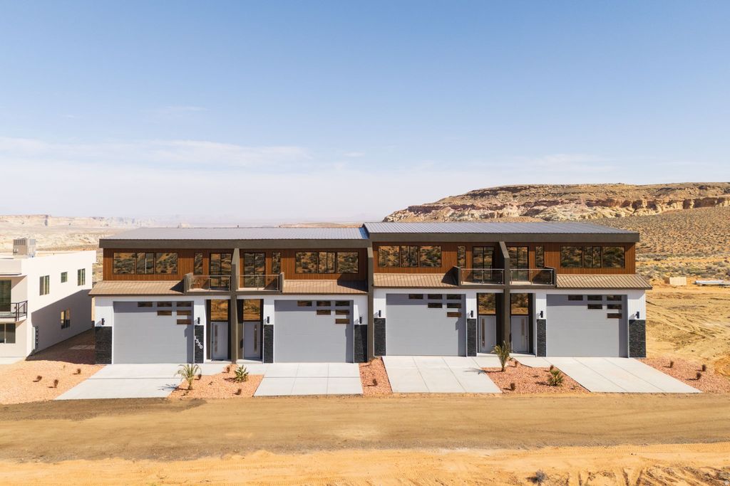 Photo of 1330 E LONE ROCK DR, Big Water, UT 84741 (MLS # 2148211)