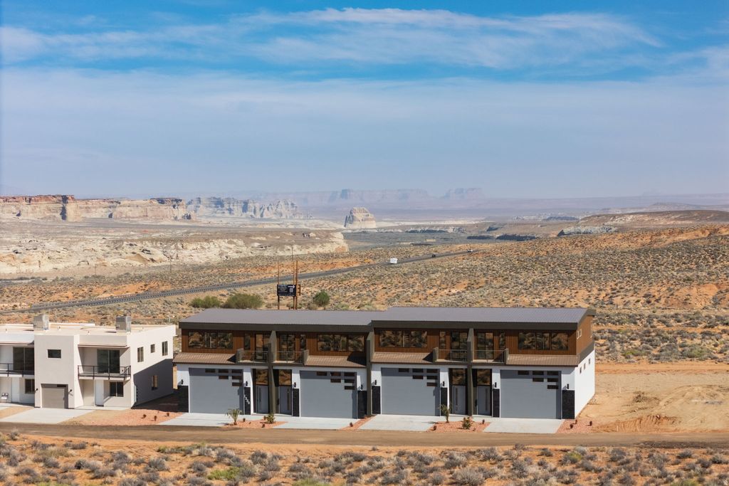 Photo of 1330 E LONE ROCK DR, Big Water, UT 84741 (MLS # 2148211)