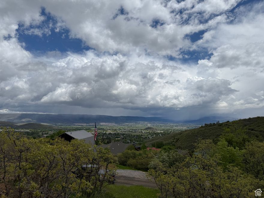 Exceptional opportunity for luxury buyers or investors looking to secure a premium homesite in a rapidly growing alpine market. This uphill lot on Basel Drive offers panoramic, unobstructed mountain views with year-round access and no HOA restrictions. Ideal for a high-end second home or legacy property-just 15 minutes from the new Mayflower Resort and under 30 minutes to Deer Valley, Park City Mountain, and Canyons Resorts. Snow removal is managed by Swiss Alpine Water Company. Recent perc test completed, with septic system installable on the upper end of the lot.