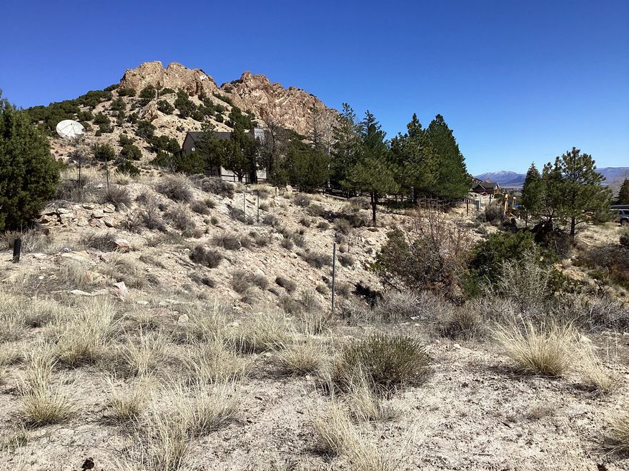 Stunning and RARE VIEW LOT in Cedar Cliff Estates  - on Wyo side of STATELINE Road.  Nice VIEW level area for building your dream Lake House.  Shared driveway with home on left. Sellers would love to sell the lot with the home next door.