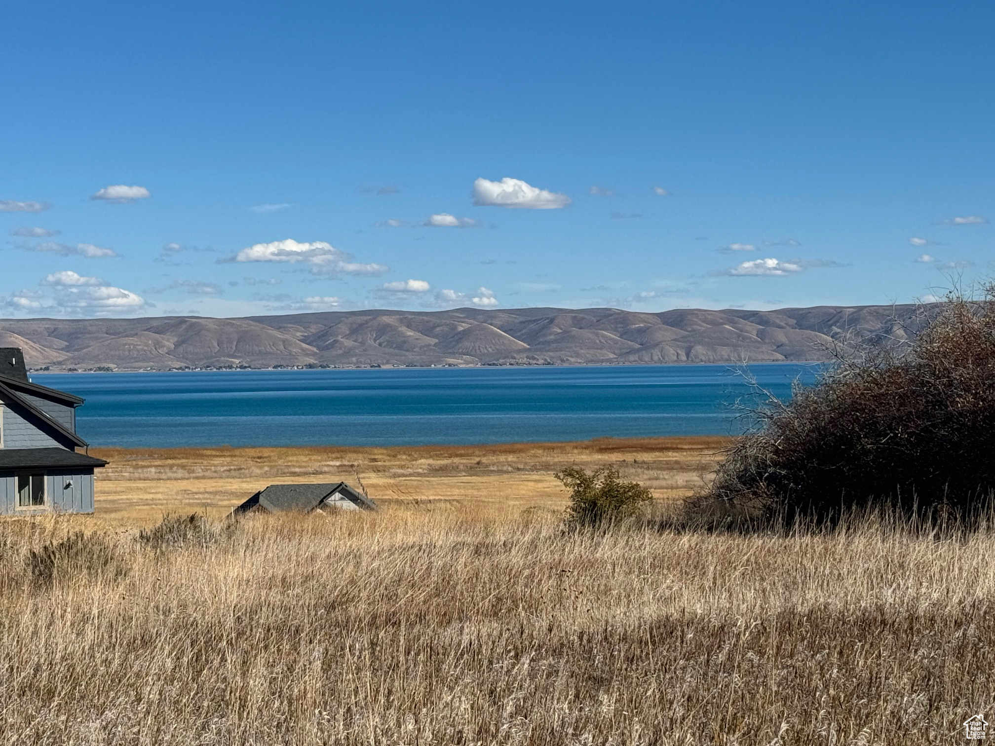 Excellent building lot with all utilities stubbed, paved road, and views of Bear Lake!! Located in the private and gated community of The Reserve at Bear Lake with clubhouse, fitness room, two heated pools (seasoal), hot tub (year round), poolside pavilion, splash pad, sports court, playground and gated beach access. Fish Haven Canyon access for ATV/UTV, snowmobiling, snowshoeing, hiking and mountain biking. Bear Lake State Park Marina 10 min; Beaver Mtn Ski Resort 25 min.