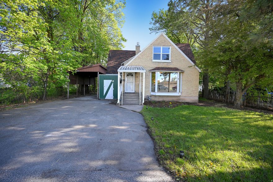 2-story brick charmer 2,435 sq ft .36-acre lot 2.5 water shares. This home delivers space, flexibility, and standout features from the moment you walk in. You'll find 4 bedrooms (2 upstairs, 1 on the main, 1 in the basement), plus a full bath on the main and a 3/4 bath downstairs waiting for some updates. The main-floor bedroom is ready to double as a guest room or office with a Murphy bed and new queen-size mattress, while hallway built-ins keep everything neat and organized. Large windows bring in tons of natural light, and the living room is anchored by a newer gas fireplace insert. Downstairs, the basement offers a generous footprint that's primed for transformation-your blank-canvas space to update and make your own. The kitchen has been completely updated with all-new stainless-steel appliances, and the nearby backyard access off the kitchen/dining area makes entertaining a breeze. All of this in a highly walkable neighborhood close to public transit. Buyer to verify all.