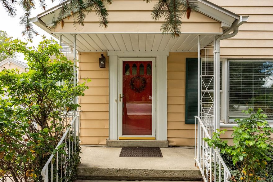 This charming East Murray cottage is set on a remarkable .35 acre parcel, offering a rare combination of space, privacy and beautifully curated outdoor living. The fully fenced, park like yard is a true highlight, featuring stone walking paths, irrigated raised planter boxes, a gently flowing stream that leads to a small pond, mature trees, cedar groves with grapevines and a whimsical treehouse that adds to the property's unique character. Inside, the home has been thoughtfully updated and offers a warm, inviting atmosphere throughout, beginning with a welcoming front sitting room with gas fireplace and adjoining formal dining area.The well appointed kitchen includes bar seating for four and ample cabinetry, flowing into an additional sitting area with a second gas fireplace and newly added French doors that open to the back deck, creating a seamless connection to the outdoor setting. The main level features three bedrooms, along with a newly renovated three quarter bathroom and a full bath. The finished lower level provides additional living space with a generous family room and a large laundry, storage and mechanical area. A two car garage is connected via a breezeway, completing this distinctive property where the outdoor experience is as compelling as the home itself.