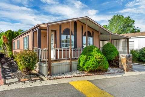 Photo of 1109 W BARBERRY DR #135, Taylorsville, UT 84123 (MLS # 2158329)