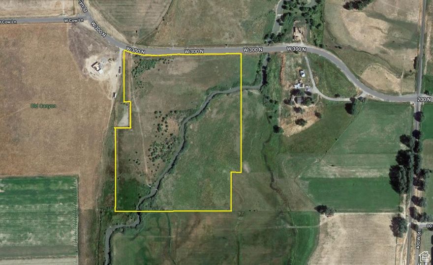 Riverfront gem in Mona.  Rare opportunity to own a piece of heaven.   This 30-acre parcel provides many options for its use.  Wonderful family getaway close to Utah Valley & in the shadow of Mount Nebo -Scenic loop.  This is just outside of Mona city limits in Juab County.  Current Creek runs through the middle of the property.  There is an irrigation ditch that runs down from the southeast corner of the property into Current Creek.  Sub-irrigated pasture land.  Excellent grazing for horses, sheep, or cattle, family farm.  It sustains 10 to 15 head from spring to fall with year-round flowing water.  Hiking, ATV, and motorcycle trails right up the road to the west & East to Mount Nebo.    Mona Reservoir & the crystal clear Burraston ponds with rope swings are nearby.  Many possible uses.  Include RV Park, industrial, commercial, residential, etc..  It is in a flood zone.  There is very easy access to power on the north from the Goshen Canyon Road.  No water rights come with the property.   Some of the properties nearby are on wells and septic.  The east side (about 13 -14 acres) is prime grazing pasture that is always green & lush, and the thick green grass grows 3 to 4 feet tall.  The lot is fully fenced.  Great horse property, owners see deer, pheasant & ducks  plenty of bird watching, etc..  Wonderful location.