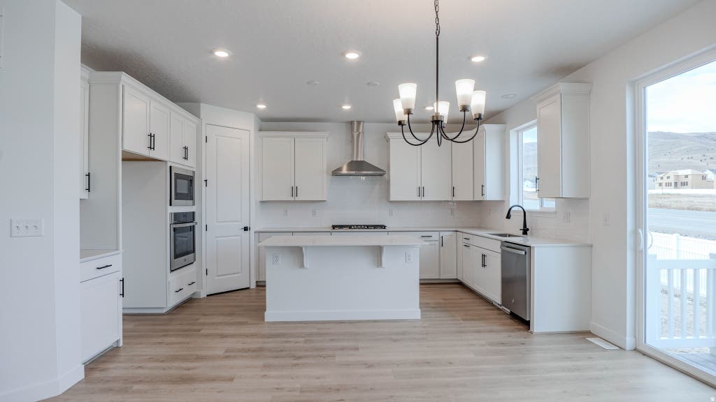Photo of 12159 S ASPEN CREEK LN #103, Herriman, UT 84096 (MLS # 2176465)