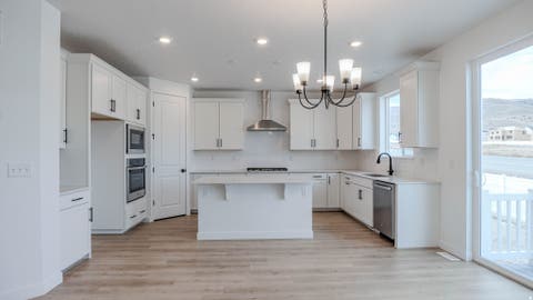 Photo of 12159 S ASPEN CREEK LN #103, Herriman, UT 84096 (MLS # 2176465)