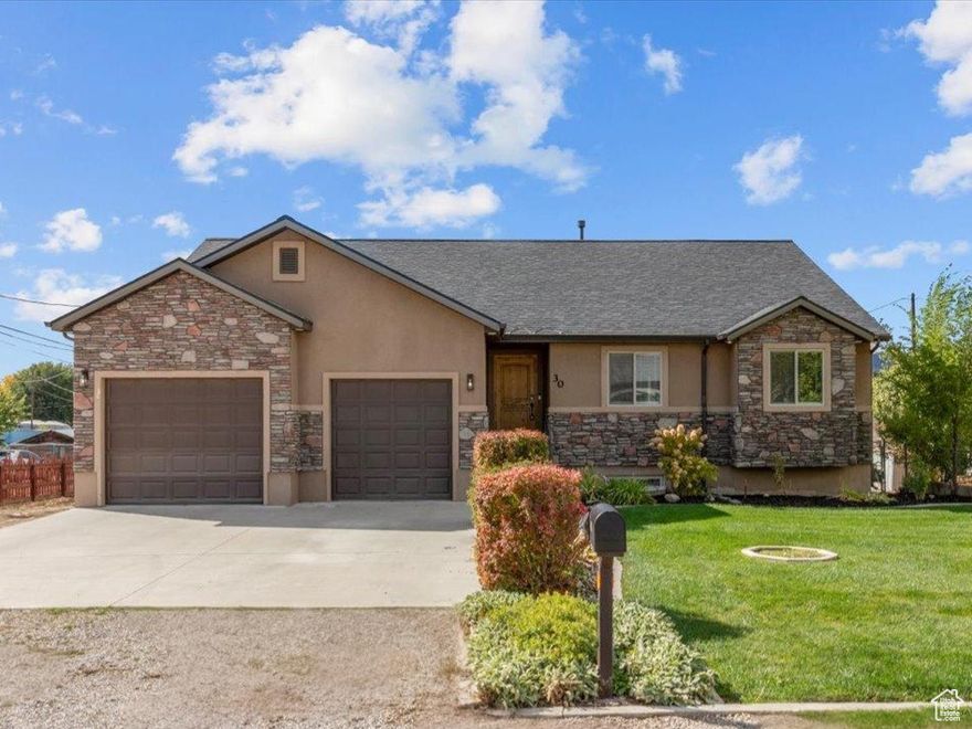 Seller offering a $5,000 lender credit - available exclusively to buyers financing through our preferred lender. Please contact Gina to learn more. Welcome to this charming 6-bedroom, 3-bath rambler nestled in the heart of Manti, Utah-a perfect blend of comfort, function, and small-town charm. Step inside to find a warm, inviting living area highlighted by vaulted ceilings, beautiful wood-look laminate flooring, and a cozy fireplace that sets the tone for relaxing evenings or gatherings with loved ones. The open-concept design flows effortlessly between the kitchen, dining, and living spaces, enhanced by updated lighting that adds a modern, stylish touch.  The daylight basement is bright and spacious, featuring a convenient walkout entrance, ample storage, and a large bonus room, that is wired for surround sound - ideal for movie nights, family games, or hosting guests. With six bedrooms and three full baths, there's plenty of room for everyone to spread out and feel at home.  Outside, enjoy the beauty of Manti's peaceful surroundings from the expansive deck overlooking the large backyard. The outdoor space is designed for fun and functionality-it includes a covered patio, cozy firepit, and a generous detached shed/workshop perfect for projects or extra storage. There's also plenty of space for RV parking, fruit trees, and even room to create your dream garden, sport court, or pool area.  This home truly offers something for everyone-warm, welcoming living spaces inside and endless possibilities outdoors. Don't miss your chance to make this beautiful Manti rambler your forever home. Schedule your private showing today! Square footage is provided as a courtesy estimate only and was obtained by county records. Buyer is advised to obtain an independent measurement