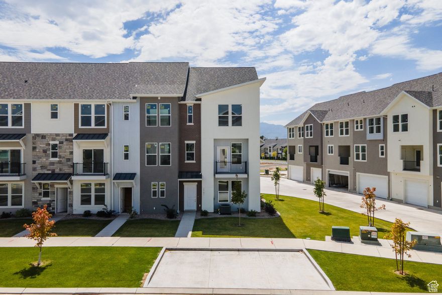 End unit Biltmore at The Ridge at Spanish Fork- This property is move-in ready and offers one of the most open and spacious main floor layouts available. With picture windows on every wall, the home is filled with natural light, creating a bright and welcoming atmosphere. All three bedrooms and two full bathrooms are located on the third floor, providing a private and comfortable living space. Nestled on the east side of Spanish Fork, The Ridge boasts breathtaking mountain and valley views, along with exceptional amenities including a clubhouse, fitness center, indoor/outdoor pool, new pickleball courts, and a dog park.  Contact us today to schedule a tour and learn more!  Use our preferred lender and receive a $10,000 credit toward a rate buydown or closing costs.  Sign a contract in October and receive additional incentives!