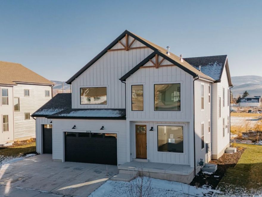 ***HUGE PRICE DROP PLUS LENDER INCENTIVE***$224,000 in upgrades including hardie board siding - covered rear patio- 42" fireplace with ship lap detail  - gourmet tile backsplash -  KitchenAid appliances - double ovens - gas. cook top -stacked cabinetry -  large island - lvp flooring - quartz countertops- carpet -  spa like shower with dual shower heads-  double sinks - Smart TV wiring -designer lighting -  spacious 3 car garage - finished basement - fully landscaped and maintained by the HOA.  The Copperview Farmhouse is designed for today's homebuyers, offering 4,204 square feet of finished living space, eye-catching curb appeal, and premium upgrades throughout.  This home delivers style, comfort, and value for families and modern lifestyles. Call or stop by today!