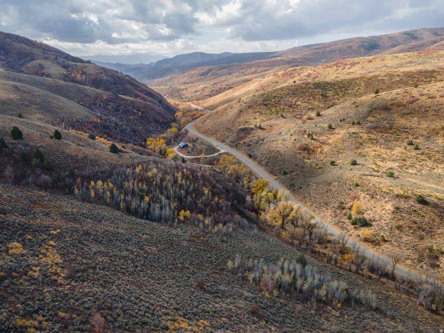 Welcome to an extraordinary 5-acre lot in the picturesque Beaver Creek Area of Huntsville, UT.  A blank canvas waiting for your vision! Seller Financing Available. Nestled in a serene valley, this stunning property boasts beautiful trees and a gentle creek running thru, creating the perfect backdrop for your retreat. Whether you're dreaming of a weekend escape or planning your future getaway, this is the ideal lot for your adventures. **Prime Location:** Conveniently located right off Highway 39, access to this beautiful lot is a breeze, no matter the season. You're just a stone's throw away from stunning Causey Reservoir, as well as a quick 15-minute drive to the charming town of Huntsville-where you'll find all the amenities you need. **Easy Directions:** To visit the lot, simply head east from Huntsville Town on Highway 39. Continue straight past Red Rock Restaurant, then go past the house with the Blue roof on the right and keep an eye out for mile marker 31. Look for red flags marking the property edges, and a sign identifying your future paradise hangs in the trees as well as along the side of Hwy 39.! **Amenities and Planning:**  Please contact the Beaver Creek Lot Owner's Association for information regarding available water rights. The agent is happy to assist you with any questions and provide a vendor list for large culvert installation, ensuring easy access to the lot. **Visualize Your Future:** Aerial pictures are attached allowing you to fully appreciate the incredible landscape and possibilities that await. Don't miss out on this unique opportunity to own a legacy property.  Contact us today for more information and let's start shaping your dream getaway in Beaver Creek! Visit the HOA website for more insights: [Beaver Creek Lot Owner's Association](http://beavercreekowners.com/info).