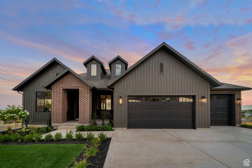 LOT#112. This beautiful Concerto plan by Symphony Homes is in a brand new community on the east bench, offering stunning mountain and lake views! Brand new home and already fully landscaped! Lots of upgrades and lovely interior design. You will love the custom trim work throughout the home, the stunning primary suite, the covered deck, and spacious floor plan. The finished daylight basement is great for entertaining all of your friends, featuring a game room and finished wet bar. You must see this home in person! The beautiful open kitchen has a 36" dual fuel range, custom vent hood, a large island, and plenty of space for your loved ones to gather. Don't miss it!