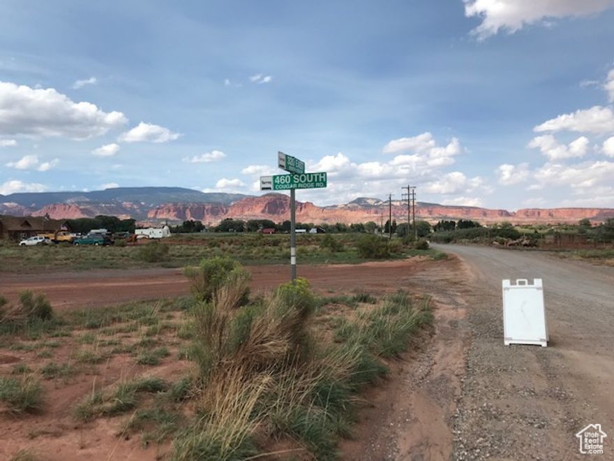 Beautiful 7.14 acre lot in Wayne county, Just feet from Torrey city limits. May be easily subdivided to 3 lots, more are possible..  Culinary water is in the road, not stubbed. Power & high speed internet near.