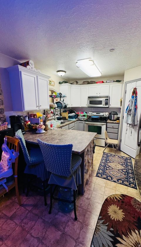 Tiny photo for 3543 E ROCK CREEK RD #4, Eagle Mountain, UT 84005 (MLS # 2141855)