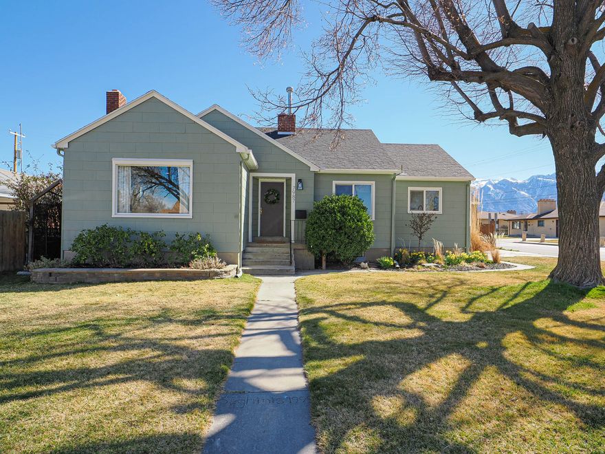***OPEN HOUSE Saturday 3/14 10AM to 12PM*** This 3-bedroom, 2-bath rambler in Midvale blends timeless character with thoughtful updates throughout. As you step inside, you're welcomed by a formal entryway that leads into a home filled with architectural details, including original hardwood floors throughout much of the main level. To the left of the entry, arched openings lead into the spacious family room, where large windows fill the space with natural light and a fireplace creates a warm focal point. Across the hall, the sizeable formal dining room flows seamlessly into the fully updated kitchen, featuring new tile flooring, cabinetry, backsplash, and a large bay window that brightens the space. Just off the kitchen, a convenient mudroom provides direct access to the side yard. The main level also includes the primary bedroom, ideally located near a full bathroom with dual sinks, built-in storage, and an arched tiled shower and tub. A versatile den-also suitable as a bedroom-features glass doors that open directly to the back patio. Additional built-in storage in the hallway adds everyday functionality. Downstairs, the finished basement offers even more living space with a large second family room complete with ample closet and storage space, with potential to convert into an additional bedroom if desired. A spacious bedroom with a large closet, an updated bathroom with a glass-enclosed tiled shower, and a designated laundry room are also located on this level. Outside, the large backyard is designed for both relaxation and practicality, featuring a 6-foot privacy fence, covered patio, and a large storage shed. Additional highlights include a 1-car garage with RV parking, and convenient pull-down attic storage. Conveniently located close to great schools, restaurants, and with quick access to I-15, this home offers character, space, and everyday convenience. The seller is willing to entertain any and all requests in an offer AGENTS - READ AGENT REMARKS