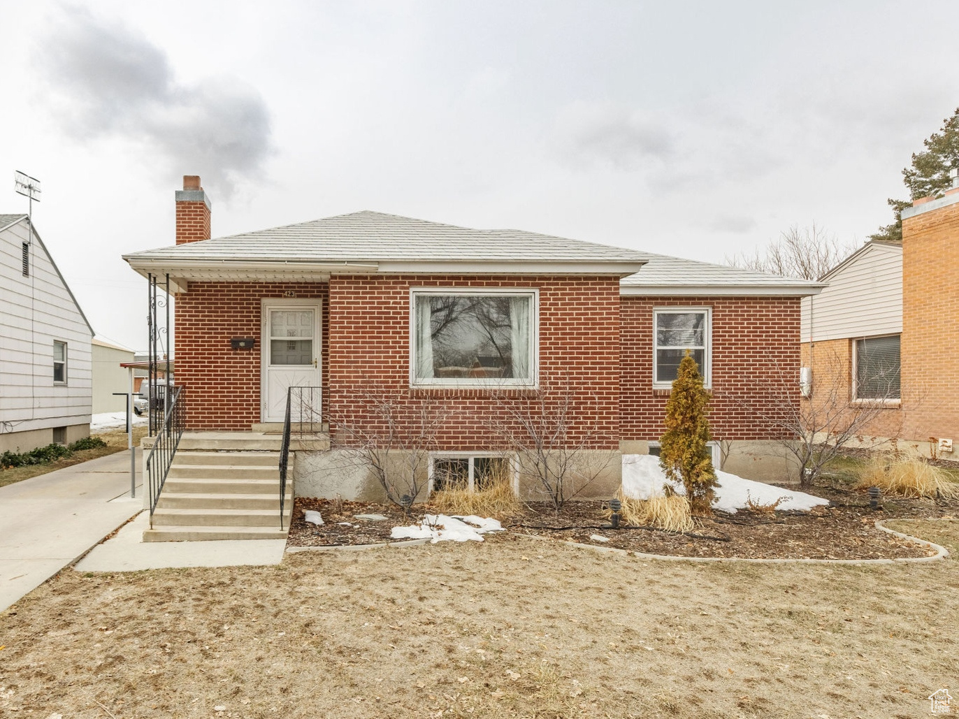 Beautiful red brick family home located in the heart of Tremonton featuring some nice updates. This home has a little bit of everything: upstairs features an updated kitchen with old style built in shelves and closets that add functionality and charm, 2 bedrooms, a front room and a huge back living room on the main floor - great for play or gathering family and friends. Downstairs has additional bedrooms with big windows that let in lots of natural light, and a great layout for a possible ADU or in home business!   Enjoy a fully fenced backyard with garden space and a chicken coop, a little strawberry patch and a cute patio- perfect for summer cookouts. A great backyard for the kids or the family pet! Backyard also has a new HUGE 10x20ft shed with loft and ground floor storage - perfect for outdoor gear, tools, toys, storage, or could be added onto to make an awesome shop or shed.  1 car garage features built in shelves, pegboard and a 240v outlet - great for running a welder or creating a garage shop.   Interior of the home has been updated with forced air, heat and AC upstairs, updated kitchen, newer roof over back living space, and much of the plumbing has been updated. Downstairs den has been insulated, wired and drywalled - easily finished into a more functional space. House is well cared for and full of potential.  A great space for a growing family!