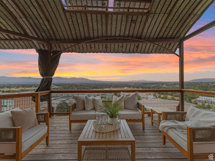Panorama view,  open floor plan,  ADU,  light-filled interiors, steam shower, bidet, solar, award-winning xeriscape front yard, and a guest-ready apartment with separate entrance.  Neighborhood voted Skiing Magaizines' best ski town.
