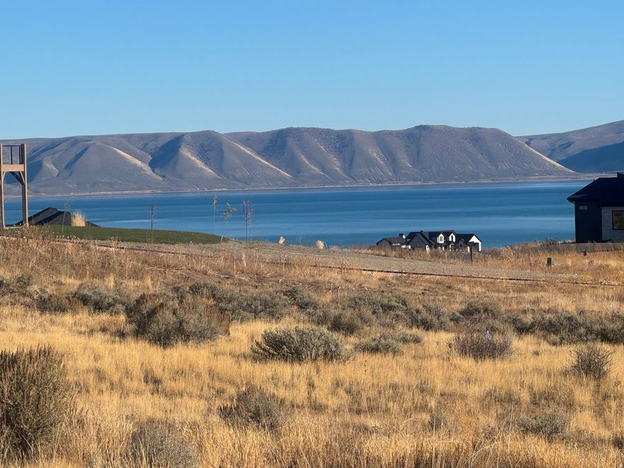 Beautiful building lot located in the prestigious gated and paved community of The Reserve at Bear Lake. This prime homesite comes ready to build with power, water, and sewer already stubbed to the property. Perfectly positioned for year-round enjoyment, the lot offers convenient access to Fish Haven Canyon, where you can explore miles of trails for snowmobiling, snowshoeing, hiking, mountain biking, and ATV/UTV adventures. Ownership includes access to The Reserve's exceptional amenities, featuring a stunning clubhouse with a fitness room, two heated seasonal pools, a year-round hot tub, splash pad, poolside pavilion, basketball, tennis, and pickleball courts, a playground, and gated beach access to Bear Lake's crystal-blue waters. This lot offers the perfect opportunity to build your dream mountain retreat in one of Bear Lake's most sought-after communities.