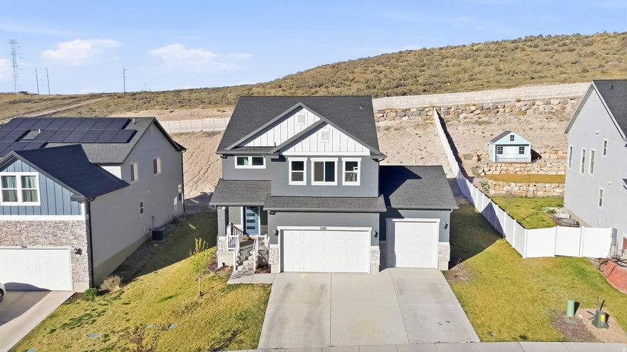 **CREATIVE FINANCING AVAILABLE ON THIS HOME** Contact listing agent for more information 801-898-0662. Move-in-ready Saratoga Springs home with space, style, and upgrades throughout! This desirable floorplan features a main-level office/den with double glass doors, a bright open-concept kitchen with quartz countertops and oversized island, and a stunning 2-story vaulted great room-perfect for gathering and entertaining. Extra-height triple-pane sliding doors open to a rare .30-acre lot backing to open space, offering privacy and room to relax. Upstairs includes 4 spacious bedrooms, a versatile loft, and convenient same-level laundry. Enjoy 9 ft ceilings, energy-efficient 2x6 construction, zoned HVAC with dual thermostats, a mudroom, and abundant natural light. 3-car garage with RV parking potential and 220V outlet-ideal for toys, tools, or EV charging. Convenient access to Mountain View Corridor, close to parks, schools, outdoor recreation, and a community pickleball court. A perfect blend of comfort, function, and modern living-this home is a must-see! Square footage figures are provided as a courtesy estimate only and were obtained from county records. Buyer is advised to obtain an independent measurement.