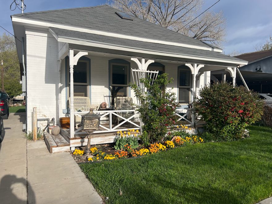 Welcome to your beautifully remodeled white brick bungalow, a perfect blend of modern luxury and serene riverside living. This charming home has been completely transformed with new electrical, plumbing, HVAC, kitchen, bathrooms, windows and more ensuring a turn-key experience for you. Step outside into the terraced backyard, where you can relax among the lush landscape with a contemporary glass fence that allows you to enjoy views of the Price River.  Located just a short stroll away from vibrant local galleries, shops, restaurants, and parks, this home provides the ideal balance of peaceful retreat and lively community. With high-end finishes throughout, every corner of this bungalow exudes quality and style, making it a truly special place to call home.Square footage figures are provided as a courtesy estimate only, buyer is advised to obtain an independent measurement. The Property Owner is a relative of the Listing Agent.