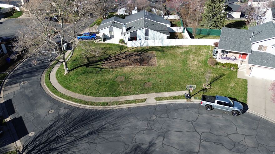 Rare opportunity to own a great lot in Farmington with beautiful mountain views! Tucked away in a quiet cul-de-sac, this property gives a more private setting with less through traffic. Enjoy the natural surroundings and scenic backdrop while still being just minutes from shopping and dining at Farmington Station, parks, and easy freeway access. Utilities are nearby, making it a convenient option for your future build. A conceptual house plan has been presented and verbally approved by the city, but bring your own designers to build the home you desire!. City confirmed that building zone and codes will be used from when original neighborhood was built in 1982. City paperwork and a conceptual building plan is attached. 2 Story House can be built. Square footage figures are provided as a courtesy estimate only and were obtained from county records. Buyer is advised to obtain an independent measurement.