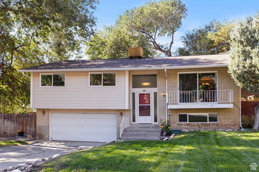 This beautiful 4-bedroom, 3-bath home is move-in ready and shines inside and out! Step inside to a comfortable open layout designed for everyday living. Outside is where this home truly stands out-unwind on the massive covered deck overlooking a fully fenced yard, complete with a majestic shade tree, relaxing hot tub, and amazing mountain views. Whether you're hosting a barbecue on the back deck or enjoying a quiet evening under the stars in your hot tub, this backyard delivers year-round enjoyment. Clean, comfortable, and ready to call home!