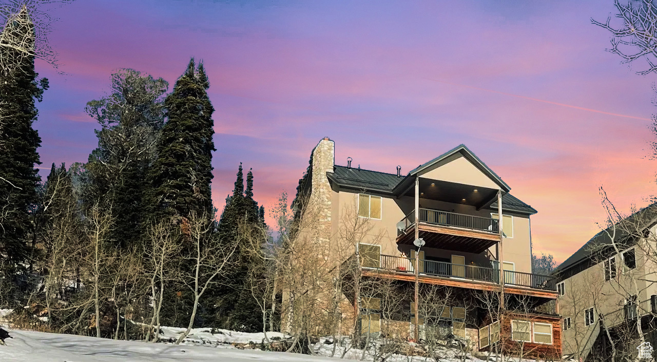 Your dream vacation home is waiting for you at Powder Mountain. Ski-in ski-out getaway with 5 bedrooms and 4bathrooms on Lightning Ridge just 20 steps away from the ski trail slowpoke that leads from the Sundown ift. Imagine waking up and having coffee on your covered deck as you pick your lines in Powder Country and taking in the views. After a great day of skiing, you invite friends over and relax in your own private bar and sneak back out for a few night runs and ski back to your home away from home. zoned for vacation rentals and being sold furnished. This room offers an incredible owner locking storage vault room that is 10 by 18 and perfect to keep all your gear or valuables safe. The ultimate mancave you must see. Ski tuning area workshop in a lower-level snowmobile garage in addition to the overside two car garage. Powder has been voted the #1 resort and there is more great terrain being enhanced with the addition of a lift in the Wolf Creek Canyon area