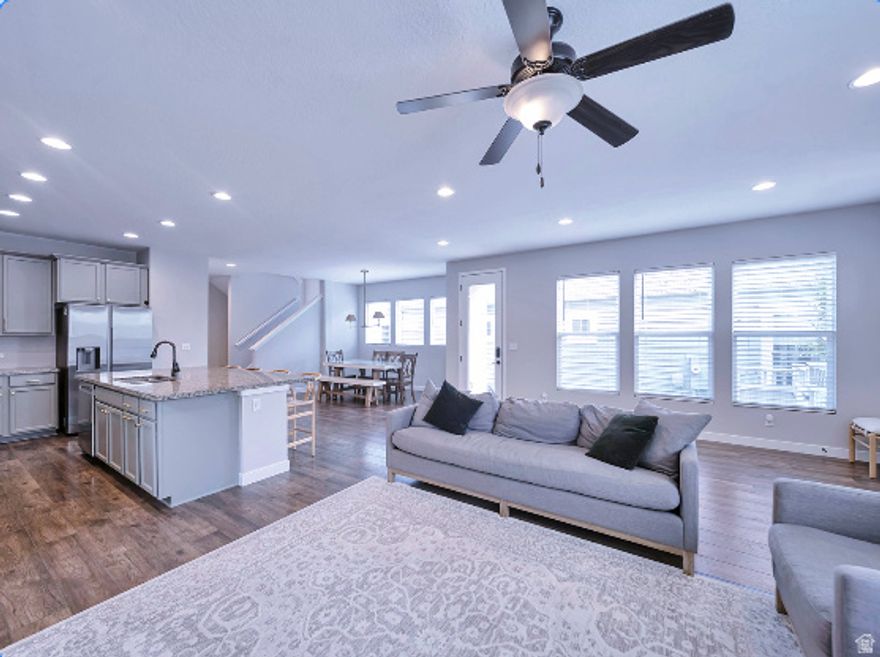 This home has been updated throughout with a beautifully custom painted kitchen and open floor plan. LVP floors on the entire main floor. Custom wall paper in the bathroom. The location is perfection and bike trails and shopping is walking distance from your home. Kid friendly and just the best block to call home. Large back yard with plenty of private space for a growing family. Finished basement with the finest touches to satisfy any Buyer.