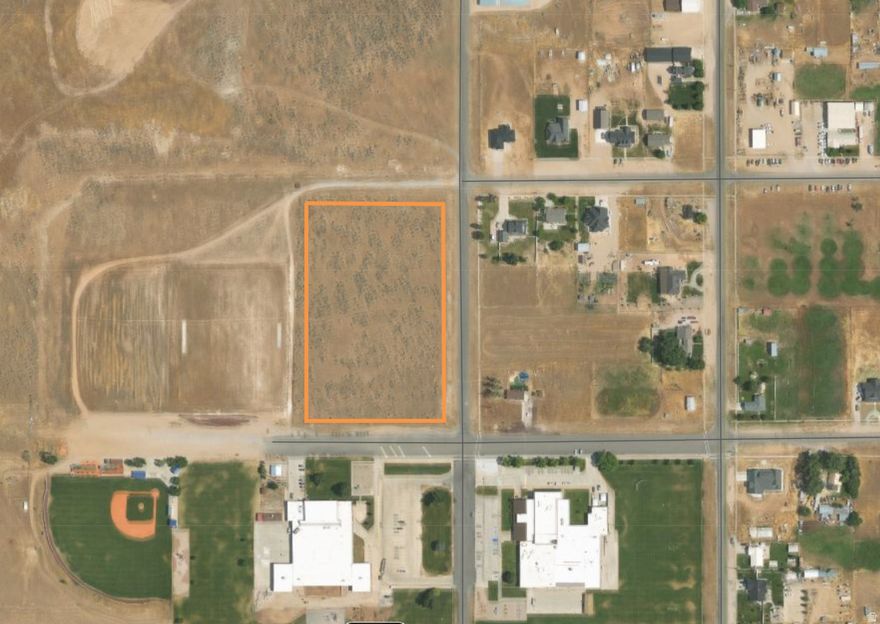 6.71 Acre lot in Fillmore City limits. This property spans from 300 South to 400 South. The frontage runs from undeveloped 300 South, along 500 West (full length of block) and also along 400 South. 500 West and 400 South are paved. Property has been surveyed. All utilities are available to connect to. Sewer line already in place along 500 West. Zoned Agriculture which allows for single family homes on 1 acre lots. You could also apply for a zone change to allow for higher density. Maps & address are approx. Great opportunity for a larger acreage to develop or use for a single building lot that allows livestock.