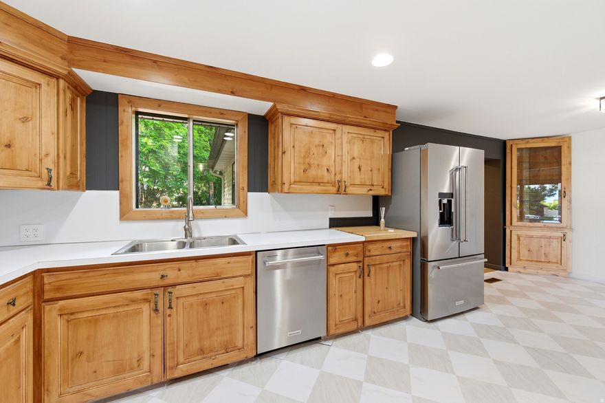 BACK ON BUYER'S RADAR  with a BEAUTIFULLY REFRESHED KITCHEN featuring all NEW modern Architect Series appliances & flooring. THE Best VALUE & QUALITY out there in a HIGHLY COVETED NEIGHBORHOOD.  This single-owner home is in IMMACULATE condition completely refreshed from top to bottom and is truly MOVE-IN READY. Newer Addition with Large Bathroom, Laundry & Separate Entrance & Parking offers a Unique Flex Space as a Primary Suite, Family Room or Rental Income Opportunity as a Pre-Approved ADU. RV & Boat Parking. Situated in one of the Top School Districts.  Prime East Bench Location-Minutes to BYU and Sundance Ski Resort. If you passed this one by before, it is worth another look-- Location, Value, Condition and Quality are untouchable in this price range. *Sq. Footage provided as a courtesy.  Buyer is advised to obtain an independent measurement. **Please note that this property has been virtually staged in some photos.