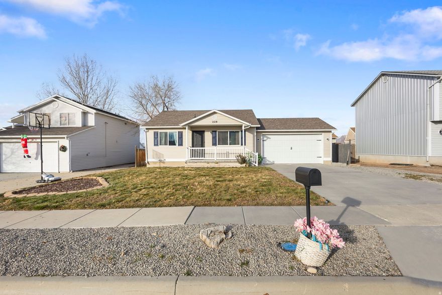 Home will be featured on Sunday's December 14th Show of Real Estate Essentials on ABC 4 Utah.  Welcome to 228 W 670 N - a beautifully updated Tooele home offering modern comfort, generous parking, and a highly convenient location. This 4-bed, 2-bath property features 1,848 sq ft of Rambler-style living space, a 2-car garage, and 4 additional parking spaces not including the garage, plus designated RV parking with space for up to six more vehicles. Bring the trailer, bring the toys - there's room for it all.  Sellers are offering 3% concessions to buyers, which can be used toward an interest-rate buy-down or closing costs, helping lower monthly payments and reduce upfront expenses.  Recent upgrades provide peace of mind and long-term value, including:  New furnace & AC (2022)  Brand-new upstairs bathtub + toilet  5-year-old stainless appliances included with sale  Washer & Dryer included  Water pressure valve replaced  Updated flooring & vanities  5-year-old garage door   Storage shed included with the purchase.   Inside, the layout is warm, functional, and perfect for everyday living. The kitchen offers ample cabinetry, great natural light, and opens comfortably into the main living areas. Whether you're entertaining, relaxing, or growing into the home, this space supports it effortlessly.  Convenience is a major highlight - close to shopping, recreation, everyday essentials, and highly anticipated development:  4 minutes to Walmart  7 minutes to Home Depot  7 minutes to the new Smith's  5 minutes to Macy's  2 minutes to All Star Bowling & Entertainment  Tooele  3 minutes to the new Founder's Pointe Shopping Complex: Sierra, Hobby Lobby, Ross Dress for Less, Five Below, Ulta Beauty, TJ Maxx, Chipotle, Wingstop, Chili's, Bath & Body Works  35 minutes to Salt Lake International Airport  40 minutes to downtown SLC  Homes with this level of updating, parking capacity, and location access are rare - come see why this one stands out.  Home is priced to sell quickly. No showings on Friday and Saturday as the sellers will be moving to their new home. Buyer to verify all information.