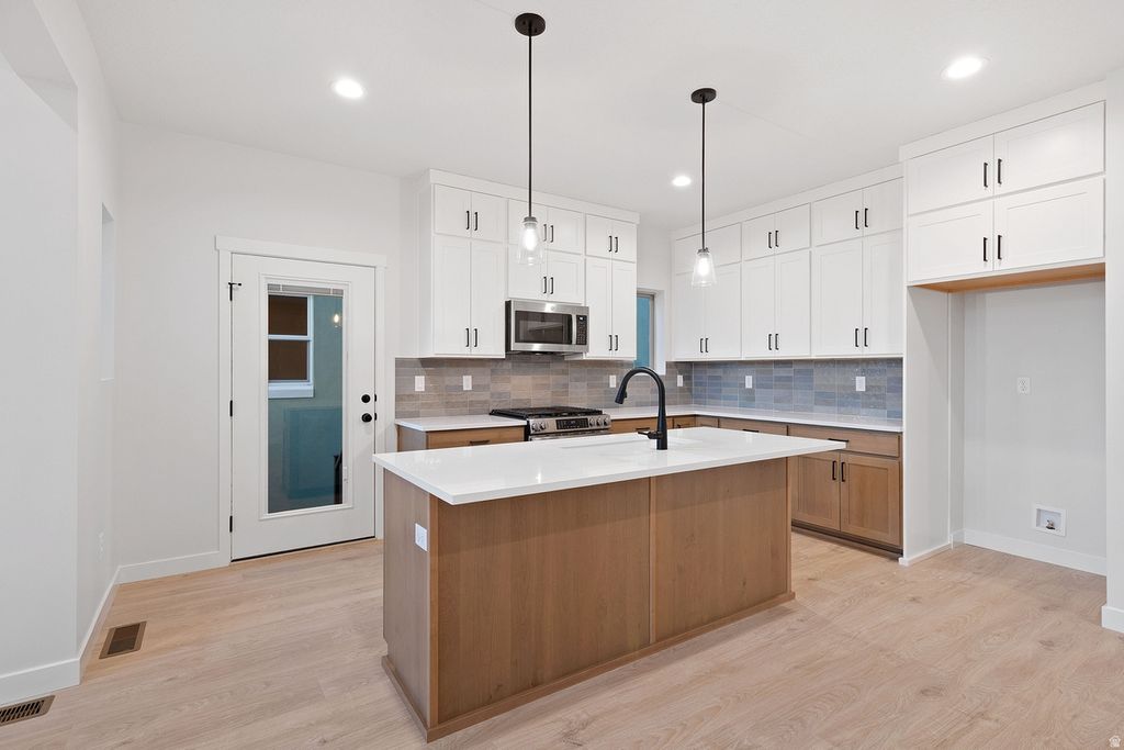 Photo of 11383 S EASY BEE RD, South Jordan, UT 84009 (MLS # 2130062)